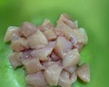 A picture of step 1 of Almonds and cashew nut chicken.
