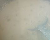 A picture of step 1 of Ice cream loaded mango.