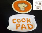 A picture of step 7 of White and orange rice (cookpad logo).