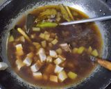 Foto langkah ke 3 dari resep Rawon Iga Tahu Putih.