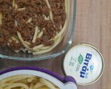A picture of step 4 of Pastitsio 🧅🍅🧄.