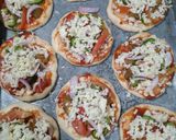 A picture of step 5 of Chicken tikka pizza.