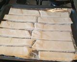 A picture of step 8 of Garlic parmesam breadsticks (made in Breadmaker).