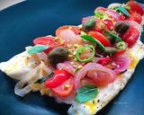 Foto del passaggio 5 della ricetta Filetto di branzino alla mediterranea