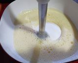 Foto del paso 4 de la receta Bizcocho cebra borracho de naranja y chocolate