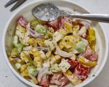 A picture of step 5 of Greek salad with ranch dressing.