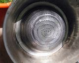 A picture of step 10 of Dambun Shinkafa.