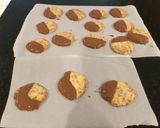 A picture of step 7 of Milk Chocolate Dipped Toffee Shortbread Cookies.