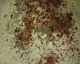 A picture of step 2 of Besni masala prahta with tomato souce.
