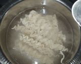 A picture of step 1 of Onion maggie and manchow maggie soup.