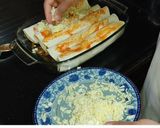 A picture of step 8 of Cheesy Mexican Chicken Fajita Wraps.