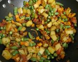 A picture of step 4 of Cauliflower carrot subji.