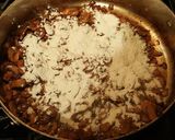 A picture of step 7 of Sausage and Mushroom Pasta in a Parmesan Cream.