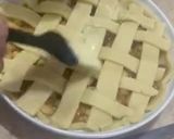 A picture of step 10 of Apple pie with flaky butter crust served with vanilla ice cream.
