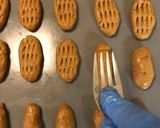 A picture of step 8 of Christmas cookies dipped in honey, aka melomakarona.