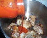 Foto del paso 3 de la receta Pollo en salsa de tomate con almendras y nueces