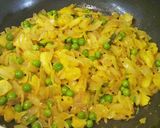 A picture of step 9 of Kaande Matar Pohe (Savory Flattened Rice With Green Peas).