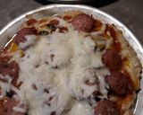 A picture of step 7 of A Real Meat-lovers Pizza and Cheesy Pizza.