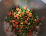 A picture of step 2 of Oats masala veggie soup.