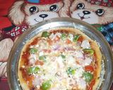 A picture of step 4 of Cheese Pizza.