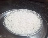 A picture of step 5 of String hoppers with chicken curry.