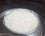 A picture of step 5 of String hoppers with chicken curry.