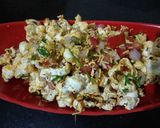 A picture of step 4 of Cheese Schezwan popcorn bhel.