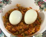 A picture of step 4 of Schezwan Mayo Egg Veg Grilled Sandwich.