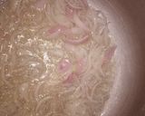 A picture of step 2 of Masoor and moong ki daal with boiled rice.