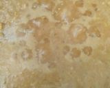A picture of step 2 of Coconut laddus.