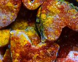 A picture of step 1 of Rohu Fish in tomato-mustard curry.