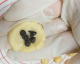 A picture of step 3 of No-Fry, Nutty Chocolate-Filled Donuts 🍩.