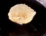 A picture of step 5 of Metha chila on tawa.