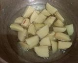 A picture of step 1 of Dahi Walay Aloo.
