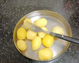 A picture of step 1 of Kashmiri Dum Aloo.