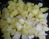 A picture of step 1 of Prawns with Potato and Green Peas.