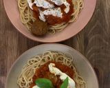 A picture of step 2 of Meatballs in a rich tomato sauce with mozzarella.