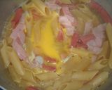 Foto del paso 7 de la receta: Fideos mostacholes con salchicha, huevo y jamón (One Pot Pasta)