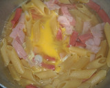 Foto del paso 7 de la receta: Fideos mostacholes con salchicha, huevo y jamón (One Pot Pasta)