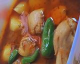 A picture of step 5 of Aloo chicken.