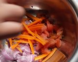 A picture of step 2 of Kachumbar nuts salad with croutons.