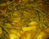 A picture of step 12 of Moringa ki sabzi.
