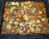 Foto del paso 6 de la receta Pollo al horno con girgolas, patatas y verduritas