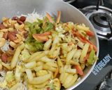 A picture of step 5 of Navratan Pulao.