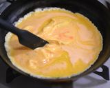 A picture of step 6 of Cheesy Omurice with Leftover Curry.