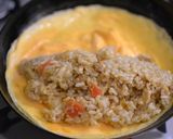 A picture of step 7 of Cheesy Omurice with Leftover Curry.