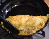 A picture of step 8 of Cheesy Omurice with Leftover Curry.