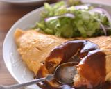 A picture of step 10 of Cheesy Omurice with Leftover Curry.