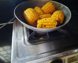 A picture of step 3 of Masala corn cob.