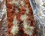 A picture of step 2 of French bread Pizza.